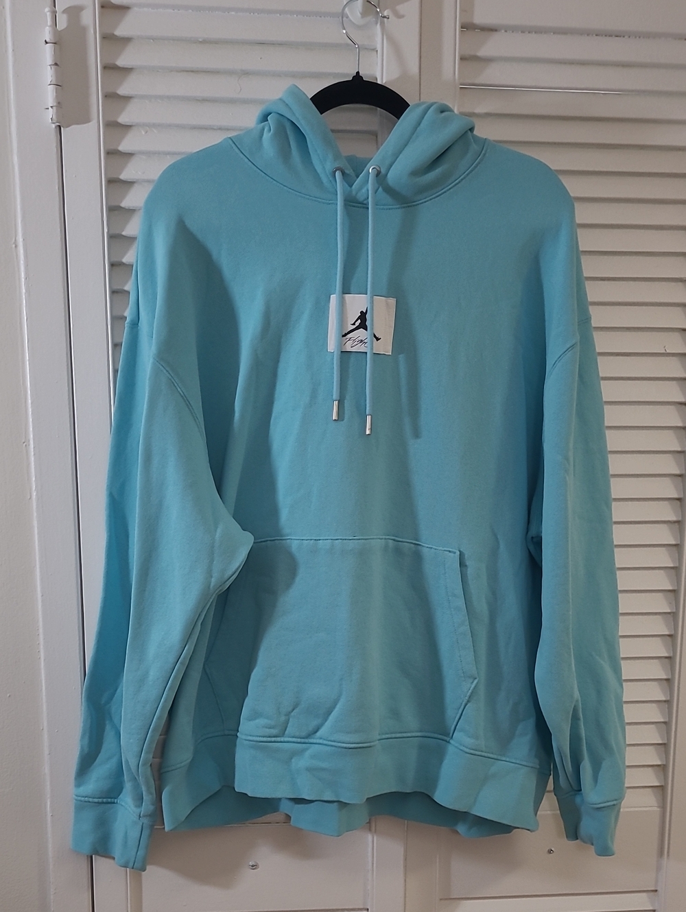 Jordan Light Blue Pullover Hoodie with Small Logo Patch